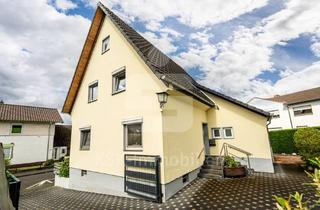 Haus kaufen in 53721 Siegburg, Gepflegtes Zweifamilienhaus in Siegburg Kaldauen mit Innenhof, Garagen und Entwicklungspotenzial.
