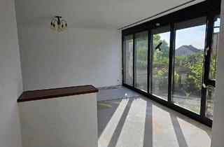 Einfamilienhaus kaufen in 42389 Wuppertal, Wuppertal - Einfamilienhaus mit Flachdach und tollem Blick auf das Wuppertal