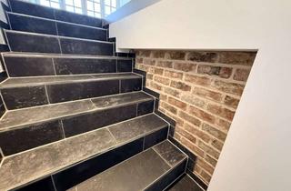 Wohnung kaufen in 41352 Korschenbroich, Stilvolle Maisonette-Eigentumswohnung mit großzügiger Dachterrasse in einzigartiger Dorfrandlage