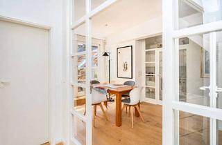 Wohnung kaufen in 10625 Charlottenburg, Kapitalanlage - Attraktive Dachgeschosswohnung in schönem Stuckaltbau