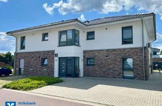 Wohnung kaufen in 48480 Spelle, Moderne Dachgeschosswohnung in einem Vierparteienhaus