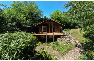 Haus kaufen in Im Gehren 7a, 76356 Weingarten, Charmantes Holzhaus in idyllischer Naturlage auf 1.106 m² Grundstück mit Dampfbad und Weinkeller