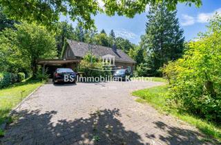 Einfamilienhaus kaufen in 26607 Aurich, Aurich - Wohnen am Waldrand! Geräumiges Einfamilienhaus mit Garage, Carport, Garten und Terrasse in