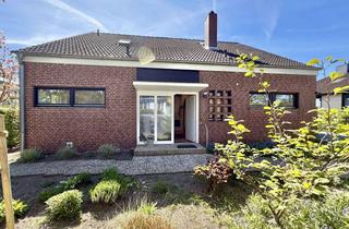 Einfamilienhaus kaufen in 30938 Burgwedel, Stilvolles und großzügiges Einfamilienhaus mit zeitloser Architektur in beliebter Wohnlage