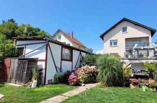 Haus kaufen in 55129 Ebersheim, Familienidylle mit Wohlfühlgarten und vielseitigen Nutzungsmöglichkeiten