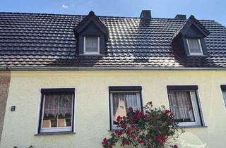 Doppelhaushälfte kaufen in 01609 Röderaue, Gemütliche Doppelhaushälfte mit großem Grundstück und Doppelgarage in ruhiger Siedlungslage