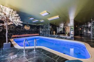 Villa kaufen in 61352 Bad Homburg, Exklusive Villa mit Pool, Wellnessbereich und einzigartigem Wohnambiente in Bad Homburg