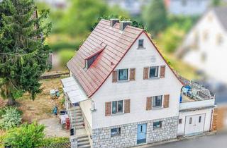 Einfamilienhaus kaufen in 97259 Greußenheim, Charmantes Einfamilienhaus mit großem Grundstück, Bj. 1955 – Ideal für Familien mit Kindern!