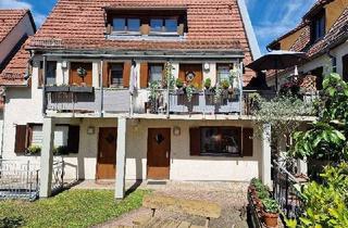 Wohnung kaufen in 90556 Cadolzburg, Charmante Maisonettewohnung – vermietet und ideal für Kapitalanleger