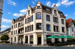 Wohnung kaufen in 24534 Innenstadt, Charmante 6-Zimmer-Altbauwohnung mit 4 Tiefgaragenstellplätzen in zentraler Innenstadtlage von Neumü