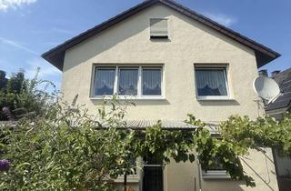 Einfamilienhaus kaufen in 36251 Bad Hersfeld, Familienidylle in der Stadt – Einfamilienhaus mit Garten und viel Platz