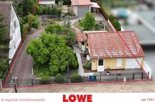 Haus kaufen in 14974 Ludwigsfelde, Kleiner Bungalow mit Wohnmobilgarage - im Flussviertel Ludwigsfelde!