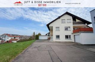 Haus kaufen in 76456 Kuppenheim, Bezugsfreies 3-Familienhaus mit sonnigem Gartengrundstück und 3 Garagen in Kuppenheim