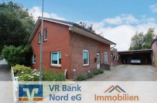Einfamilienhaus kaufen in 25842 Langenhorn, Einfamilienhaus mit Carportanlage und viel Potenzial in attraktiver und zentraler Dorflage