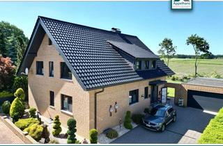 Haus kaufen in 49626 Bippen, Zweifamilienhaus mit Wintergarten, Kamin und großzügigem Garten