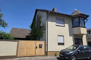 Einfamilienhaus kaufen in 68766 Hockenheim, Einfamilienhaus mit charmantem Erker und Kachelofen