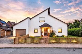 Einfamilienhaus kaufen in 34590 Wabern, Freistehendes Einfamilienhaus mit offenem Wohnbereich, Galerie und großem Garten