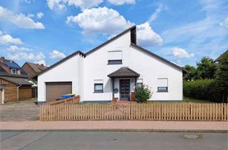Einfamilienhaus kaufen in 34590 Wabern, Freistehendes Einfamilienhaus mit offenem Wohnbereich, Galerie und großem Garten