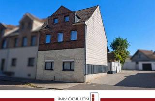 Mehrfamilienhaus kaufen in 52531 Übach-Palenberg, Mehrfamilienhaus mit drei vermieteten Wohneinheiten und Gartenanteil in Übach-Palenberg
