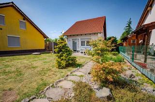 Einfamilienhaus kaufen in 67122 Altrip, Charmantes und gepflegtes Einfamilienhaus mit Garten, Terrasse und zwei Stellplätzen an der blauen A