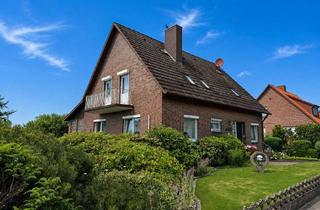 Einfamilienhaus kaufen in 29640 Schneverdingen, Grundsolides Einfamilienhaus mit Einliegerwohnung und großer Garage am Heidegarten!