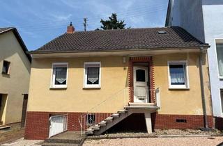 Einfamilienhaus kaufen in 66346 Püttlingen, Gepflegtes Einfamilienhaus mit Garten in zentraler Lage von Püttlingen