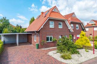 Haus kaufen in 26639 Wiesmoor, Modernisierte DHH in gefragter Lage mit extra Raumangebot