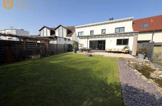 Einfamilienhaus kaufen in 63128 Dietzenbach, Zwei Häuser. Ein Zuhause. Vier Mieteinnahmen. Unzählige Möglichkeiten.