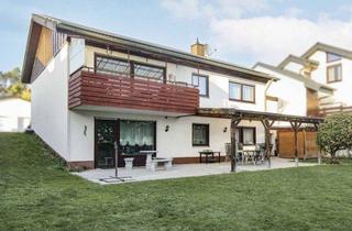 Einfamilienhaus kaufen in 91325 Adelsdorf, Modernisiertes Familienhaus mit Einliegerwohnung, Südgarten & PV-Anlage