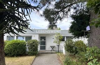 Haus kaufen in 42489 Wülfrath, Split-Level-Bungalow mit Garten und zusätzlichem Wohnbereich in Wülfrath