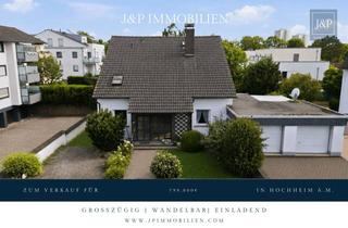 Einfamilienhaus kaufen in Dresdener Ring 36, 65239 Hochheim, Großzügiges Einfamilienhaus mit Einliegerwohnung, Wintergarten & Doppelgarage in Hochheim