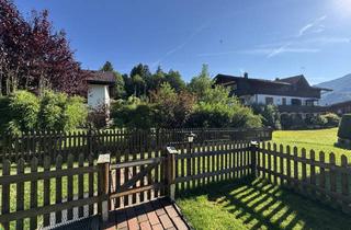 Wohnung kaufen in 83259 Schleching, Vermietete, ruhige 3-Zi.-Garten-ETW mit Ostterrasse, Kellerraum und Tiefgaragenplatz