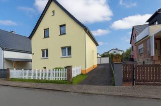 Einfamilienhaus kaufen in 35641 Schöffengrund, Modernes Familienidyll am Waldrand: Einziehen & Wohlfühlen in Schöffengrund-Laufdorf