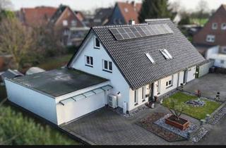 Einfamilienhaus kaufen in 49479 Ibbenbüren, Ibbenbüren - Hochwertiges Einfamilienhaus mit vermieteter Einliegerwohnung