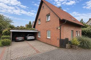 Haus kaufen in 30855 Langenhagen, Charmantes Zuhause mit eingewachsenem Garten, großem Balkon und Doppelcarport in guter Lage