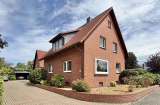 Haus kaufen in 30855 Langenhagen, Ansprechendes Zweifamilienhaus mit viel Raum für individuelle Wohnideen in guter Lage