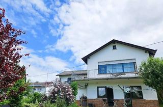 Haus kaufen in 65626 Birlenbach, Modernisierter Winkelbungalow mit traumhaften Naturblick