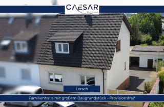 Haus kaufen in 64653 Lorsch, Familienhaus trifft Bauland: Nahezu 950 m² voller Möglichkeiten
