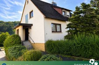 Einfamilienhaus kaufen in 55758 Mittelreidenbach, Großzügiges Einfamilienhaus mit Garten, 2 Garagen & vielen Nutzungsmöglichkeiten in Mittelreidenbach