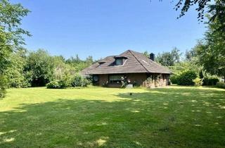 Haus kaufen in 25866 Mildstedt, Mildstedt - Freistehender Bungalow auf großem Grundstück zu verkaufen