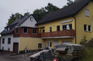 Haus kaufen in 56295 Lonnig, Lonnig - Zwei Wohnhäuser + Baugrundstück mit Doopelgarage