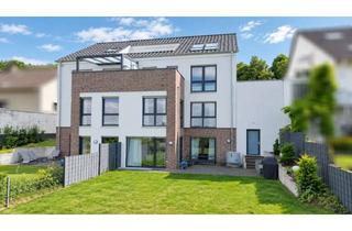 Wohnung kaufen in 33605 Stieghorst, Haus-im-Haus-Gefühl KFW 55: Moderne Garten-Maisonette über zwei Ebenen