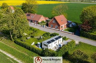 Einfamilienhaus kaufen in 26529 Wirdum, Modernisiertes Einfamilienhaus mit Einliegerwohnung und zusätzlichem Grundstück