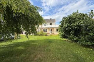 Haus kaufen in 61184 Karben, Reihenendhaus mit einzigartigem Garten in Feldrandlage