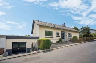 Einfamilienhaus kaufen in 65589 Hadamar, Großzügiges Einfamilienhaus mit Einliegerwohnung in bevorzugter, familienfreundlicher Wohnlage
