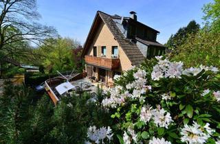 Haus kaufen in 53721 Siegburg, Zweifamilienhaus mit großem Grundstück in ruhiger Lage von Siegburg Seligenthal