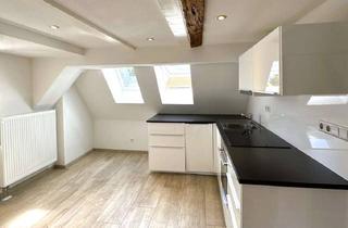 Wohnung kaufen in Schloßstraße, 71691 Freiberg, Historischer Charme trifft modernen Wohnkomfort – exklusive Maisonette mit Kamin, Balkon & TG!