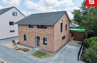 Einfamilienhaus kaufen in 49828 Neuenhaus, Neubau-Einfamilienhaus in ruhiger Ortsrandlage von NeuenhausModern wohnen – energieeffizient leben