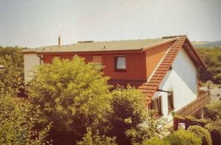 Haus kaufen in 35606 Solms, PROVISIONSFREI! MFH mit drei vermieteten Wohneinheiten – attraktive Kapitalanlage in Solms-Oberbiel