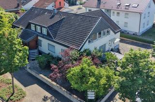 Haus kaufen in 76646 Bruchsal, Großzügiges Wohnhaus mit Praxis, flexiblem Nutzungspotenzial und Gartenidylle